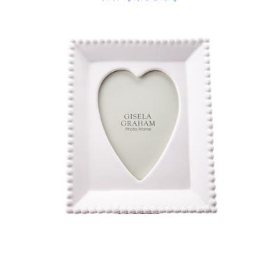 China Hotel white porcelain photo frame inside heart shape for sale