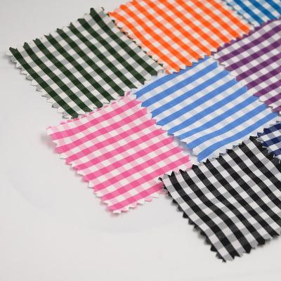 China Yarn-dyed Shrink-Resistant Check Plaid Polyester Cotton Woven Uniform Blend Fabric For Shirt Men Garment for sale