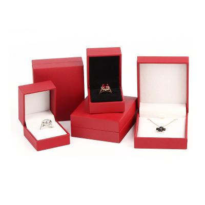 China Newest Luxury Custom Logo Printed Velvet Red Jewelry Color Box Jewelry Box for sale