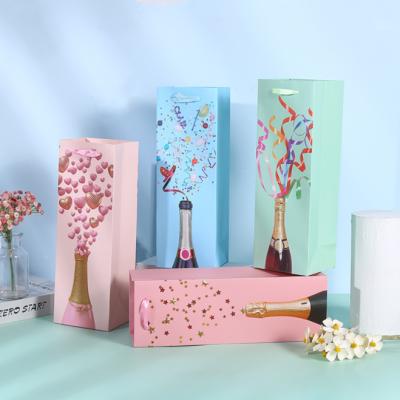 China Recyclable Luxury Customized Design Sale Cardboard Printing Bag Wine Bottle Bag Gift Whole Paper Bag With Ribbon Handle for sale