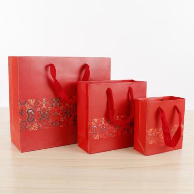 China Customized Design Paper Bag Euro Tote Holiday Gift Bag Recyclable Whole Sale Direct Selling Red Printing Bottom Price for sale