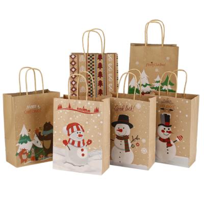 China Newest Customized Printing Recyclable Santa Design Brown Gift Bag Christmas Kraft Paper Gift Bag With Paper Handle for sale