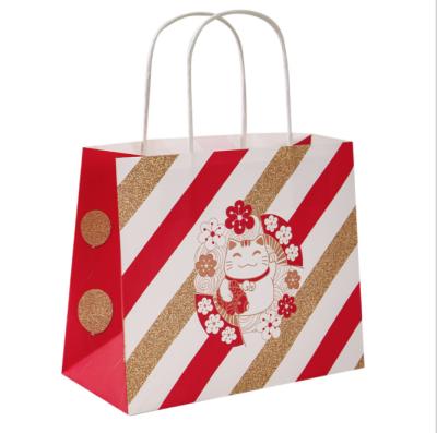 China Recyclable Cheap Custom Christmas Design Kraft Paper Gift Bag Color Print Gift Bag With Twisted Paper Handle for sale