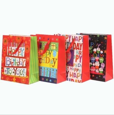 China Custom Made Luxury Handmade Happy Birthday Design Paper Bag Art Color Print Gift Paper Bag Hot Sale With Ribbon Handle for sale