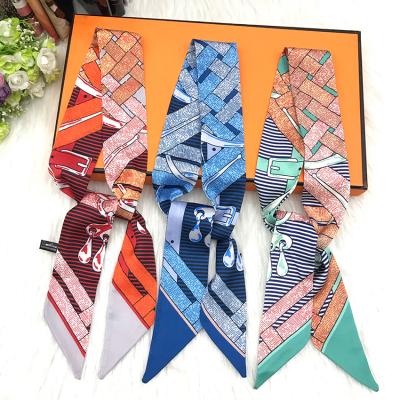 China Superior soft touch feeling ladies slim fashion silk western style autumn scarf ribbon scarf wholesales for sale