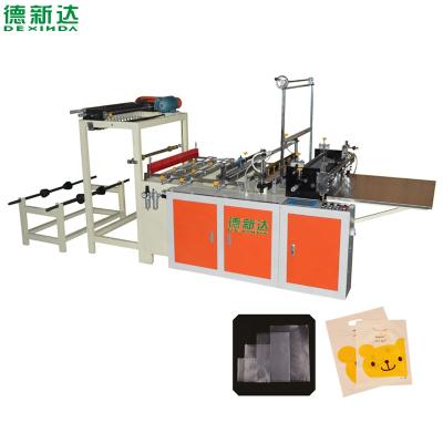 China Automatic Hotels Dexinda 700 Mm High Speed ​​Three Side Sealing Plastic Bag Making Machine for sale