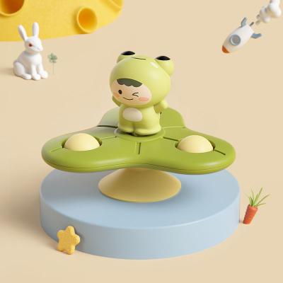 China Eco-friendly Material Food Grade Silicone Baby Toy Astronautic Carton Spinning Toy Baby Toy with Suction Cup for Kids for sale