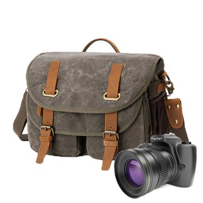 China Custom Outdoor Waterproof Canvas Camera Backpack Large Capacity DSLR Camera Carrier Bag for sale