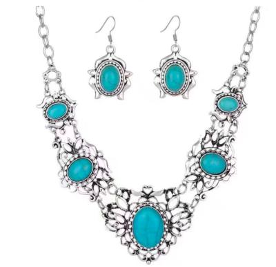 China BOHEMIA New Style High Quality Hollow Carved Oval Two Piece Set Bohemian Vintage Turquoise Necklaces And Earrings Jewelry Set for sale