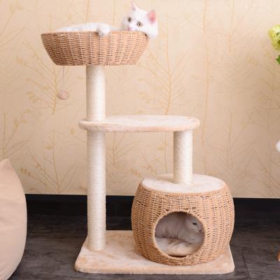 China Sustainable Top Quality Climbing Stand House Plastic Rattan Cat Tree Tower Scratching Post with Cute Hanging Ball for sale