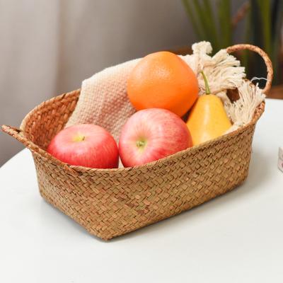 China Sustainable High Quality Oval Shape Food Fruit Organizer Hand-Woven Wicker Rattan Straw Seagrass Basket for sale