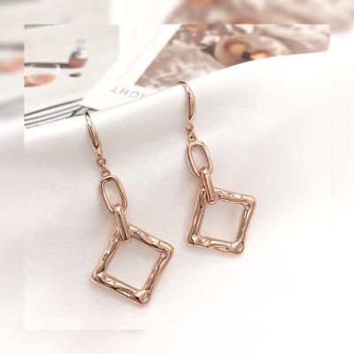 China FASHIONABLE Light Gold Real 18k Gold Earrings Big Luxury And Noble Drop Earrings Light Geometric Jewelry For Women for sale