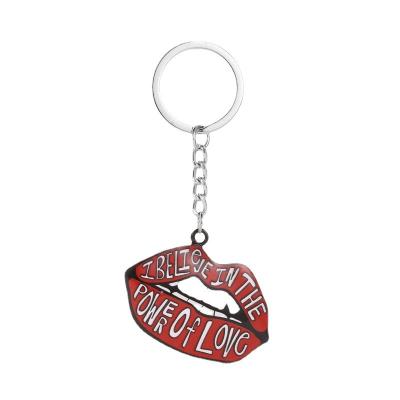 China Creative Gift Small Letter Japan Trend Lip Key Chain Accessories Metal Pendant Bag Red Key Chains for sale