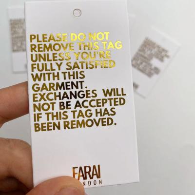 China Sustainable Women Clothing Tag Paper Hang Tags For Garment Custom Logo Gold Printing Coated 700gsm Paper for sale