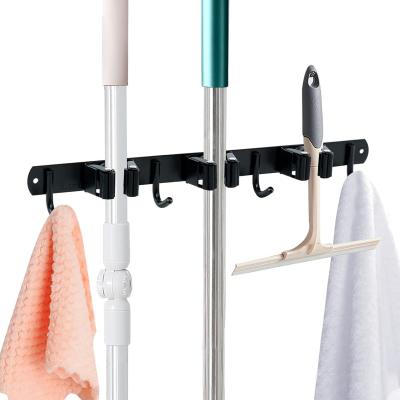 China Minimalist Limited Time Special Offer For New Product Launch Storage Rack Suitable For Wall Mounted Broom Mop Storage Rack for sale