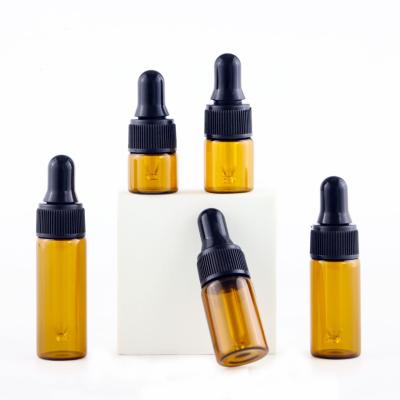 China 5ml 10ml 15ml 20ml 30ml 50ml 100ml essential oil cosmetic amber glass bottle with child safe cap made in china for sale