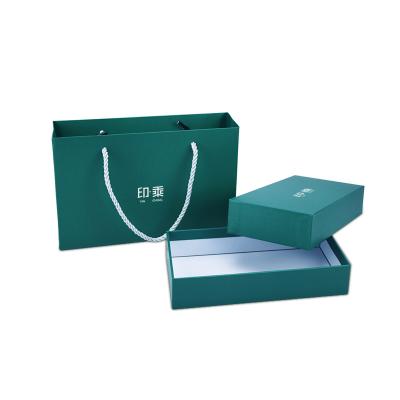 China Custom Paper Gloss Drawer Box With Portable Ribbon Handle For Apparel Packaging for sale