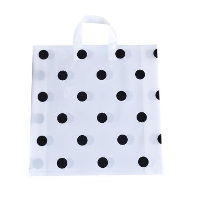 China Classic Spot Dots Shopping Small PE Frosted Plastic Tote Bag Clothing Store With Hand Gift Shopping Custom Shopping Plastic Bag for sale