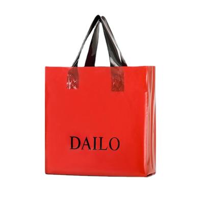 China Custom Logo Shopping Bag Clothing Store Packaging Clothing Store Gift Bag Plastic Shopping Bag for sale