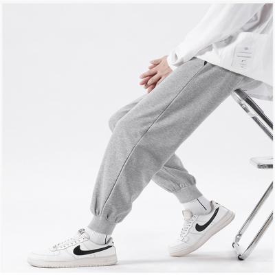 China Anti-wrinkle summer high quality men's mid-waist sweatpants jogging men's pants and trousers for sale