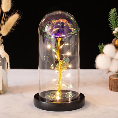 China Ceremony Factory Sale Widely Used Galaxy Rose 24K Gold Foil Rainbow Rose Led Light in Glass Dome on Black Wood Base Gold Rose for sale