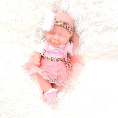 China 12 Inch Lifelike Little April Reborn Baby Full Silicone Bebe Dolls Washable Handmade for sale