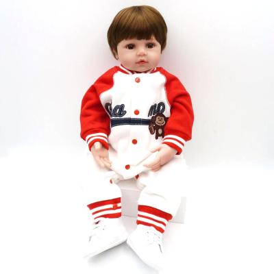 China Doll Limbs is 60cm Silicone Active Reborn Doll Realistic Vinyl Toddler Sports Boy Girl Babies Play Bedroom Bedtime Toy for sale