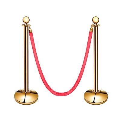 China Cement Base Cast Iron Gold Rope Braided Barrier Poles With Velvet Rope For Crowd Control for sale