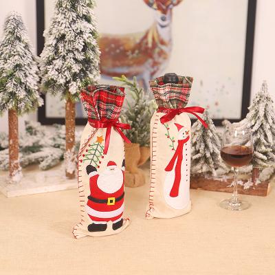 China Santa Pattern Reusable Glass Bottle Christmas Cotton Canvas Decoration Canvas Bag for sale