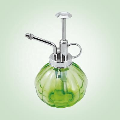 China Garden Plant Manufacturer 250ml 300ml Green Glass Cosmetic Bottle With Pressure Spray Pump for sale