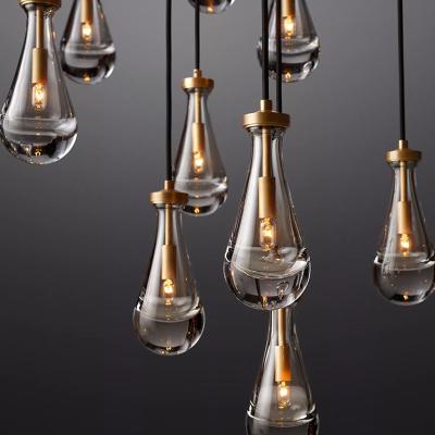 China Contemporary Modern Lustres De Decoration Gold Aluminum Metal Living Room Glass Lights Rain Chandelier Pendant for sale