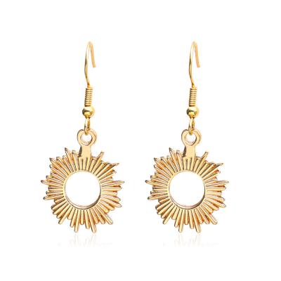 China Fashion Romantic Creative Gold Metal Central Institute of Statistics Sunflower Hollow Earrings for sale