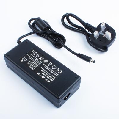 China UK Plug Universal AC Input DUSKTEC AC Plug 12 Volt 8A 100-240V CCTV Camera LED Strip Driver Adapter 12V 8000mA Desktop Power Supply UK 96W DC laptop computer for sale