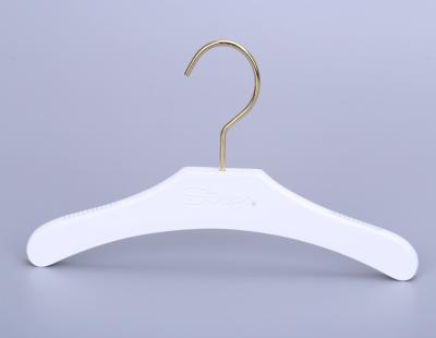 China Wholesale Cute Country Baby Clothes Hanger Wood Material White Color for sale