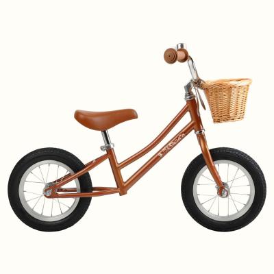 China Bicicleta de equilíbrio infantil de 12 polegadas com cesta dianteira sem pedal 18 meses a 4 anos de desenvolvimento à venda