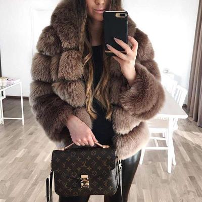 China New QUICK DRY Funny Party Fashion Short Faux_Fur Ladies Coats Cropped Top Faux Fur Coats Women Splicing Raccoon Fur Coat for sale