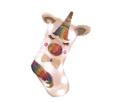 China Custom Plush Unicorn Led Plush Hanging Christmas Stocking for Holiday/Christmas Party Fireplace Decorations Unicorn Christmas Socks for sale