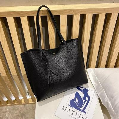 China Other Luxury Wholesale 2022 Lychee Pattern Ladies Tote Bag Large Capacity Women Tassel Shopping Bag Travel Handbags for sale