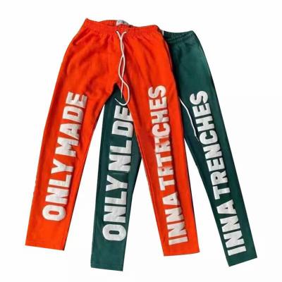 China Anti-wrinkle Streetwear Rocket Sports Tracksuit Men Jogger Cotton Pants Screen Print Skinny Raw Edge Flared Sweatpants for sale