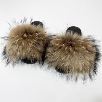 China Summer Fluffy Furry Flats Plush Fashion Trend Slides Ladies Soft Shoes For Raccoon Fur Slippers for sale