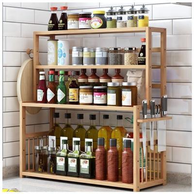 China Sustainable Rack Kitchen Spice Storage Stand 3-Tier Bamboo Shelf Bottle Holder With Adjustable for sale