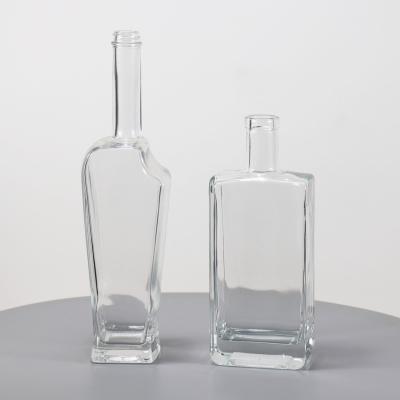 China Beverage Factory Direct Sales Custom Unique Tall Shape 750ml New Glass Bottle for sale