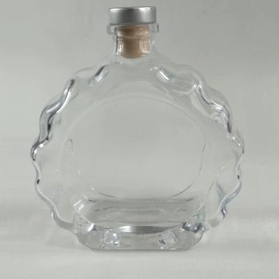 China Beverage Flower Shaped Glass Bottle 500ml Factory Cork Seal Custom Design for sale