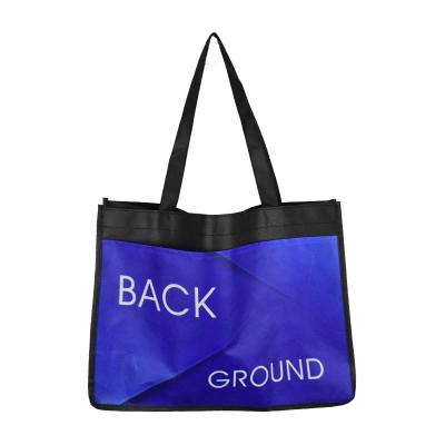 China Fashion Handled Practical Non Woven Tote Bags With Handles Shopping Bag Custom Logo for sale