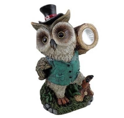 China Resin Garden Animal Figures Solar Owl Porch Projector Light for sale