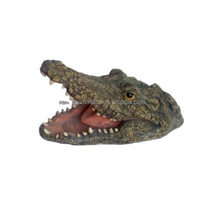 China Handcrafted Crocodile Head Polyresin Pond Ornament Water Floating Feature for sale