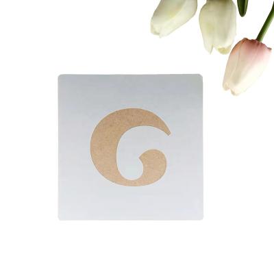 China Eco-friendly wholesale diy crafts school small PET mylar custom laser cut newspaper painting alphabet drawing letter stencils for sale