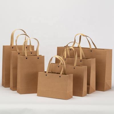 China Recycled Materials Logo Brown Shopping Bag Cardboard Custom White Paper Bags With Flat Rivet Handle for sale