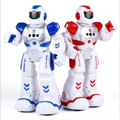 China Toy Kindergarten Intelligent Children Educational Remote Control Electric Singing Robocop Infrared Sensor Early Education Robot Toy for sale