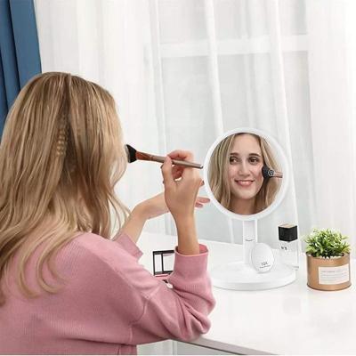 China New Gift Plastic Magic Mirror Lighted Electronic Illuminated Logo Lamp LED Touch Screen Makeup Vanity Mirror With Lights Magnifier for sale